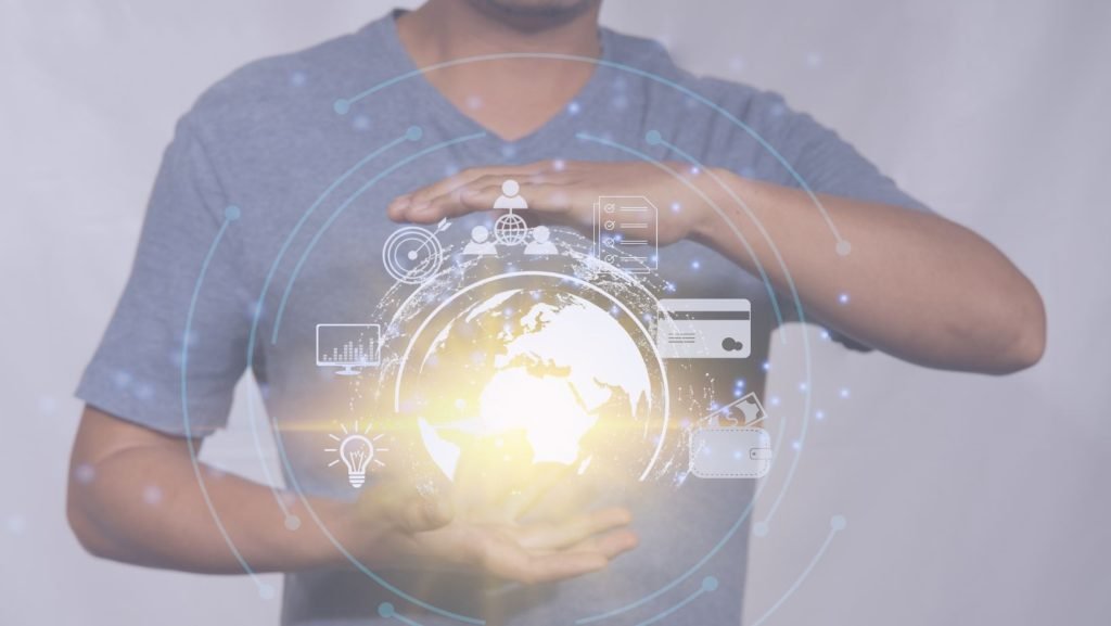 holding a virtual icon globe demonstaring contectivity